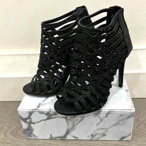 Dazzling black rhinestone cage booties.